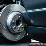 자동차 부품 재사용 방법 - Detailed close-up of a used car brake disc undergoing precision measurement with a micrometer in a p...